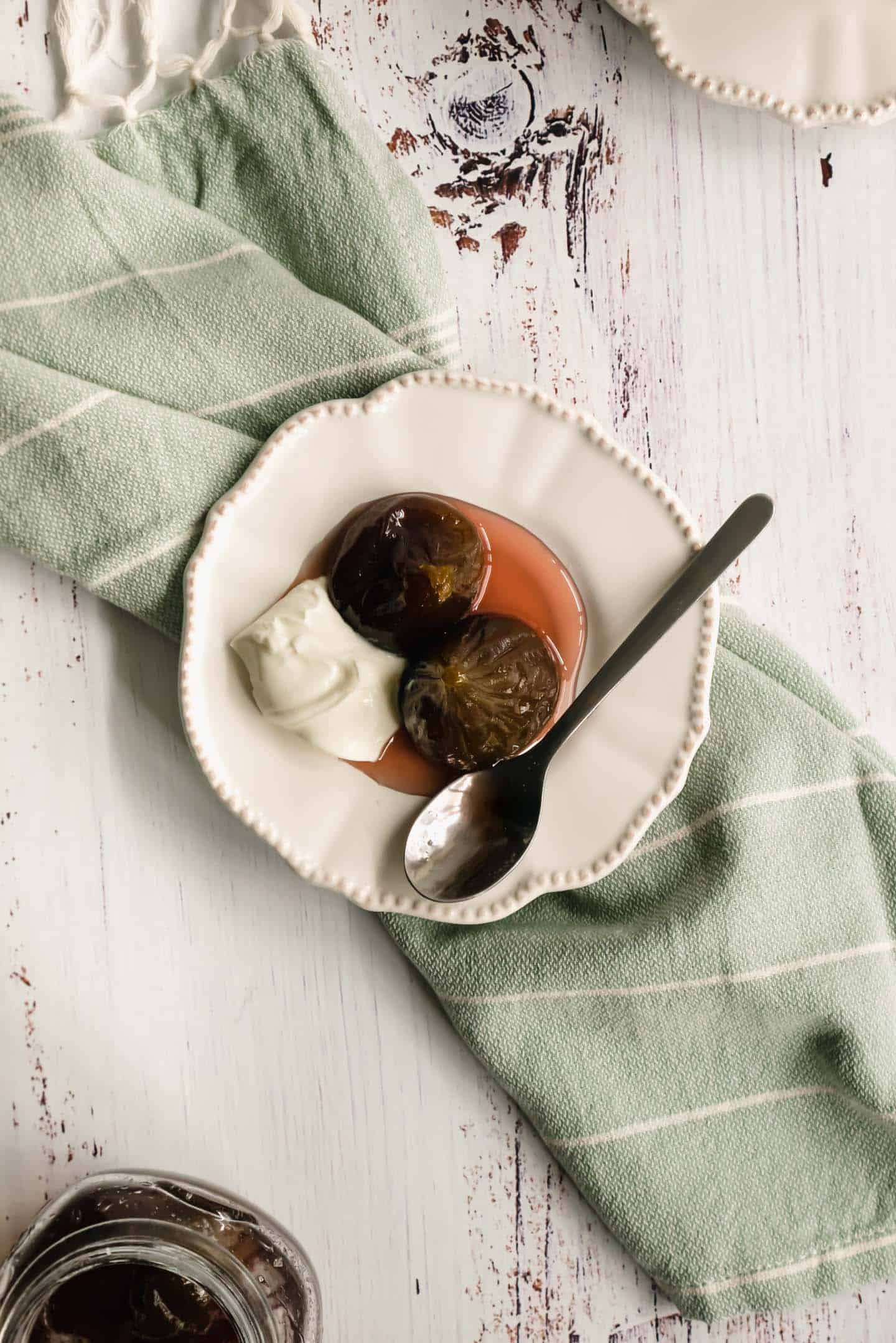 Figs in syrup with whipped cream from above