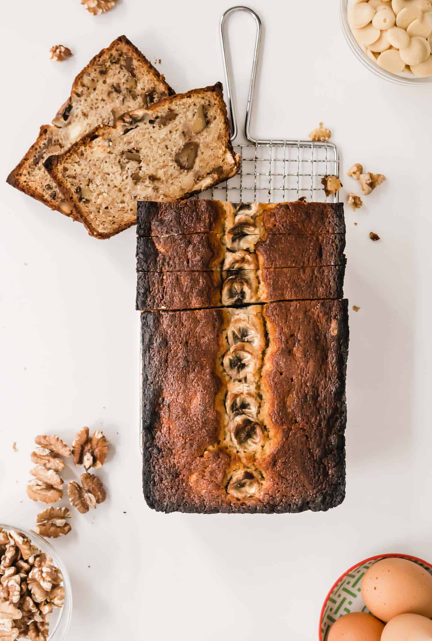 Traditional Banana Bread recipe, but enhanced with sweet white chocolate chips and crunchy walnuts. Moist, easy and quick to put together.