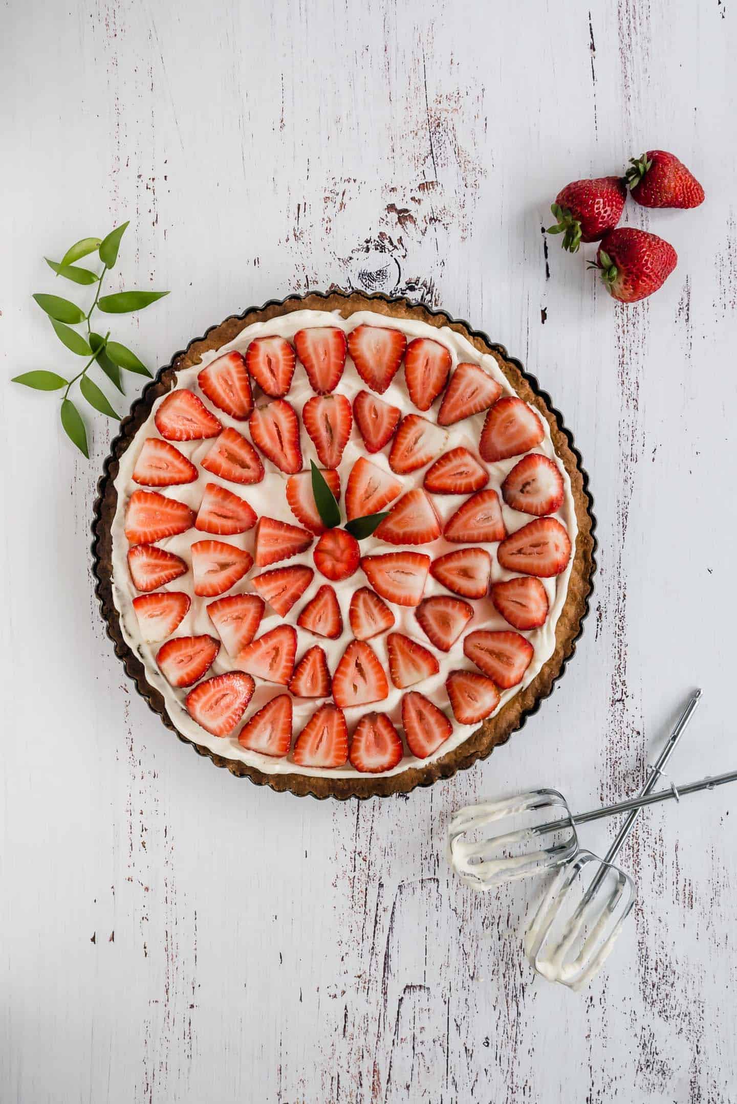 Traditional Strawberry and Cream Tart. Simple as a buttery shortbread crust, smooth creamy filling and a fresh strawberry topping. 