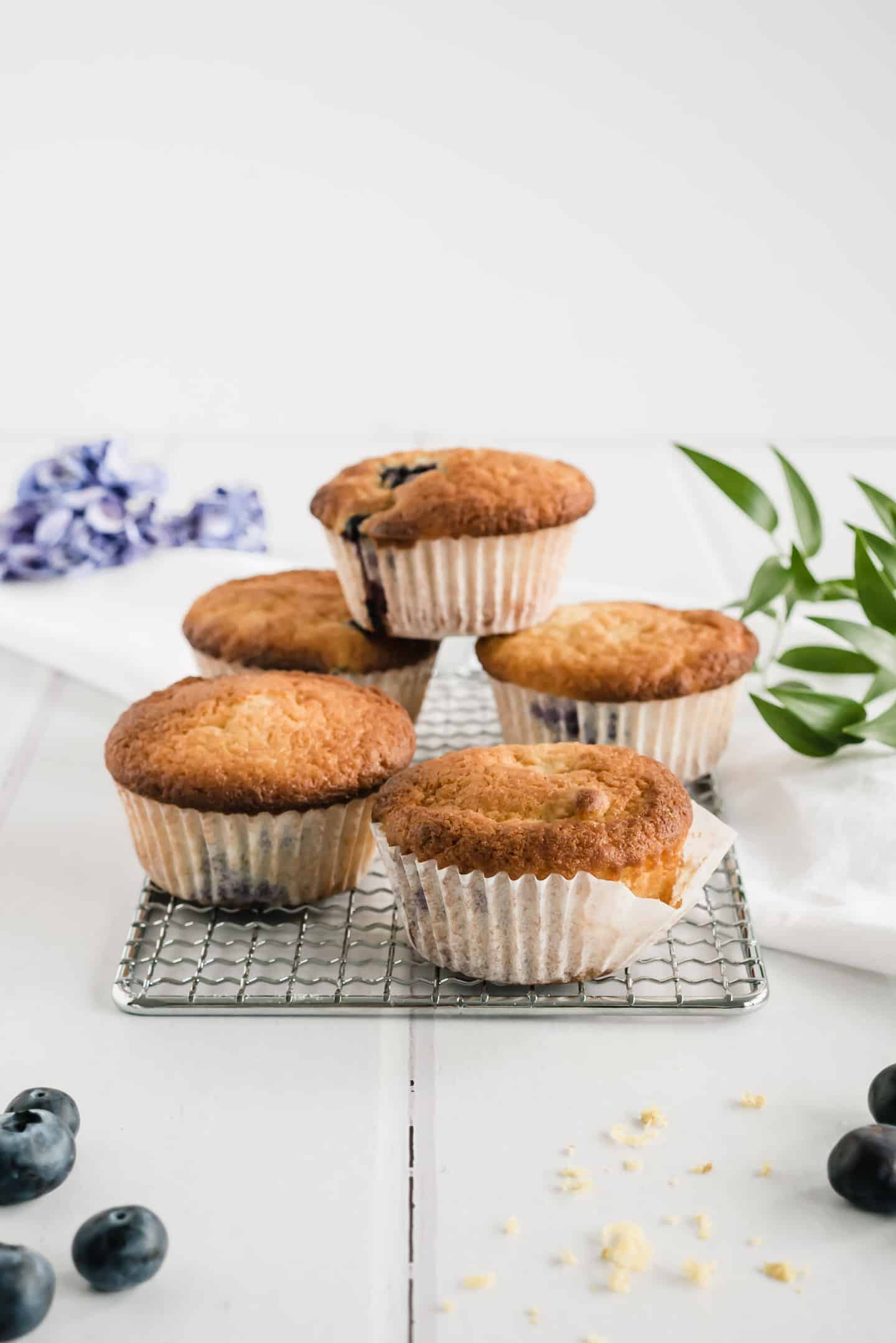 These Blueberry Muffins with natural yogurt are unbeatable: fluffy, tender, sweet juicy blueberries and a dash of lemony spark.